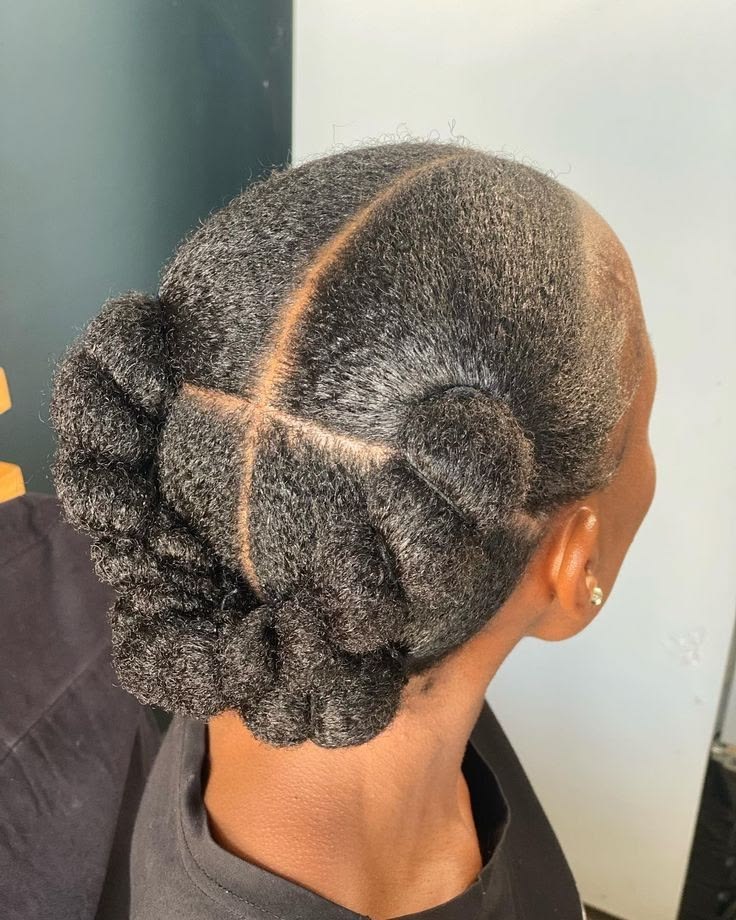 4C hair ends tucked into a simple protective hairstyle