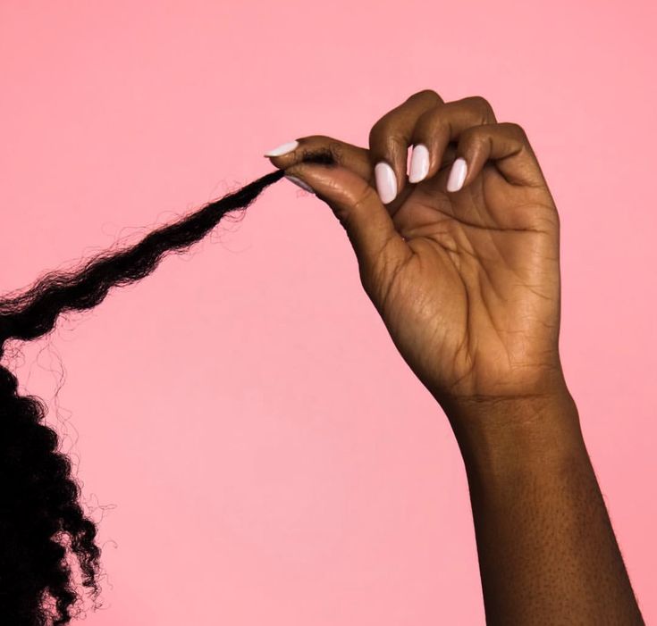 Close-up of moisturized natural hair ends during spring
