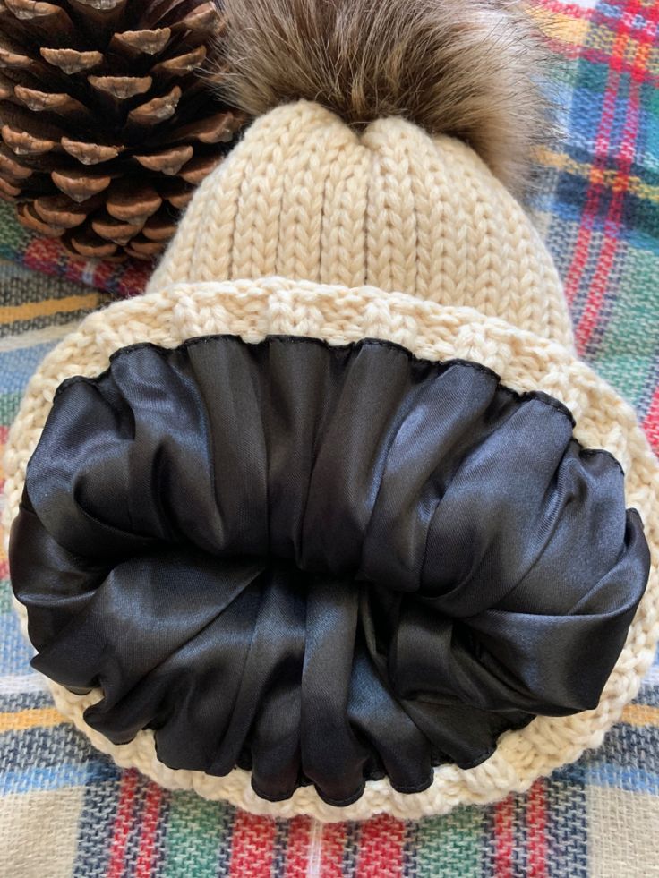 a satin lined hat for natural hair protection during winter