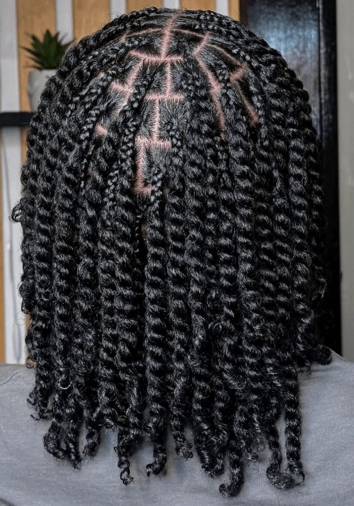 Woman wearing a comfortable protective hairstyle for natural 4C hair