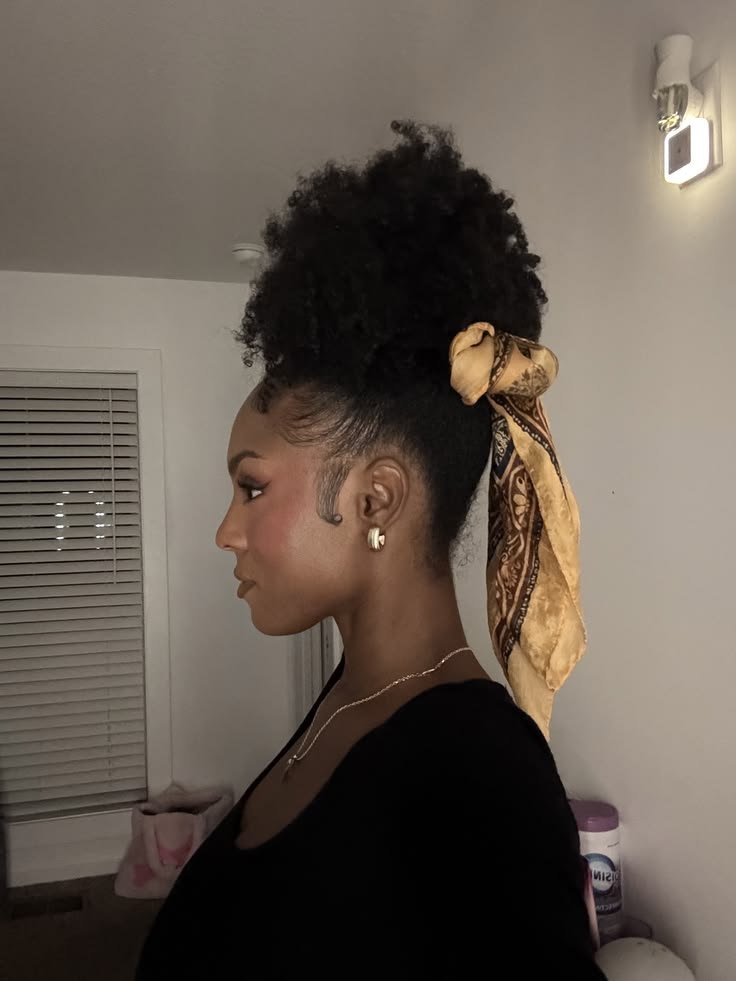 Natural hair puff decorated with a satin scarf