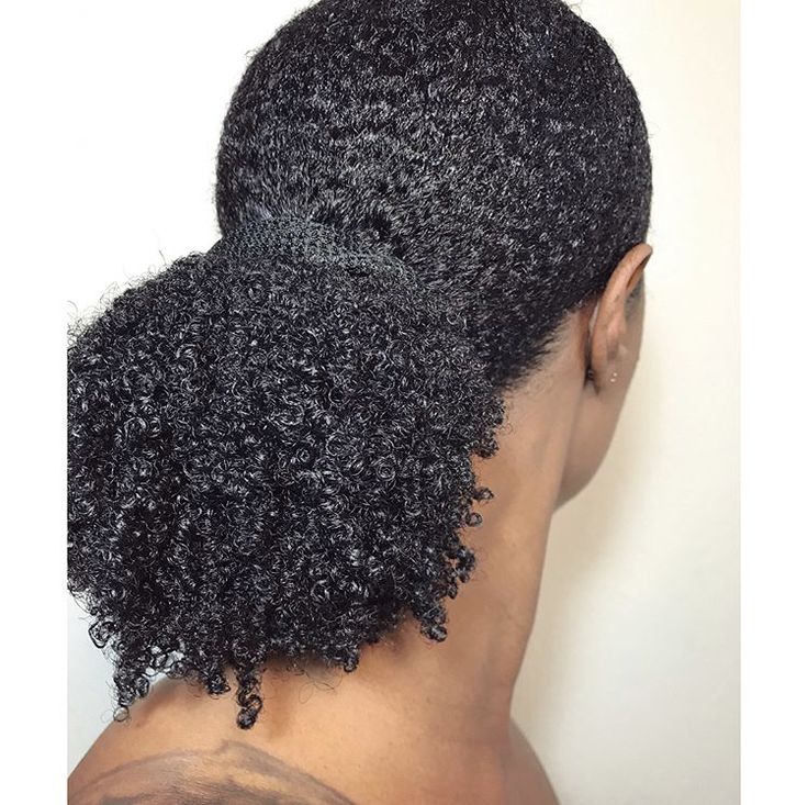 A woman with long type 4 hair