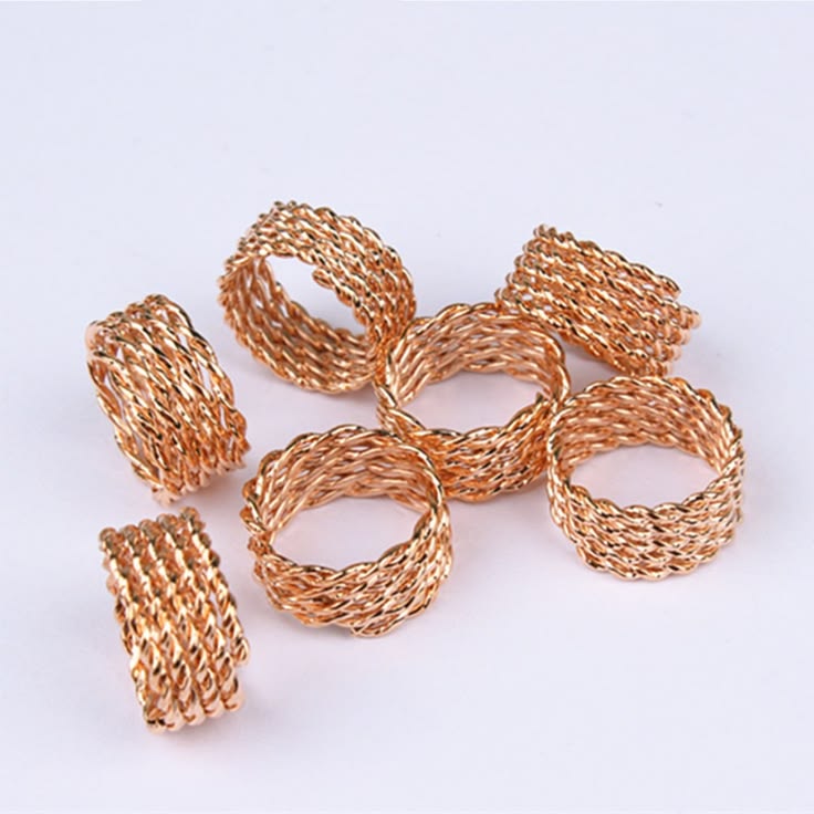 Natural hairstyle decorated with rose gold hair cuffs