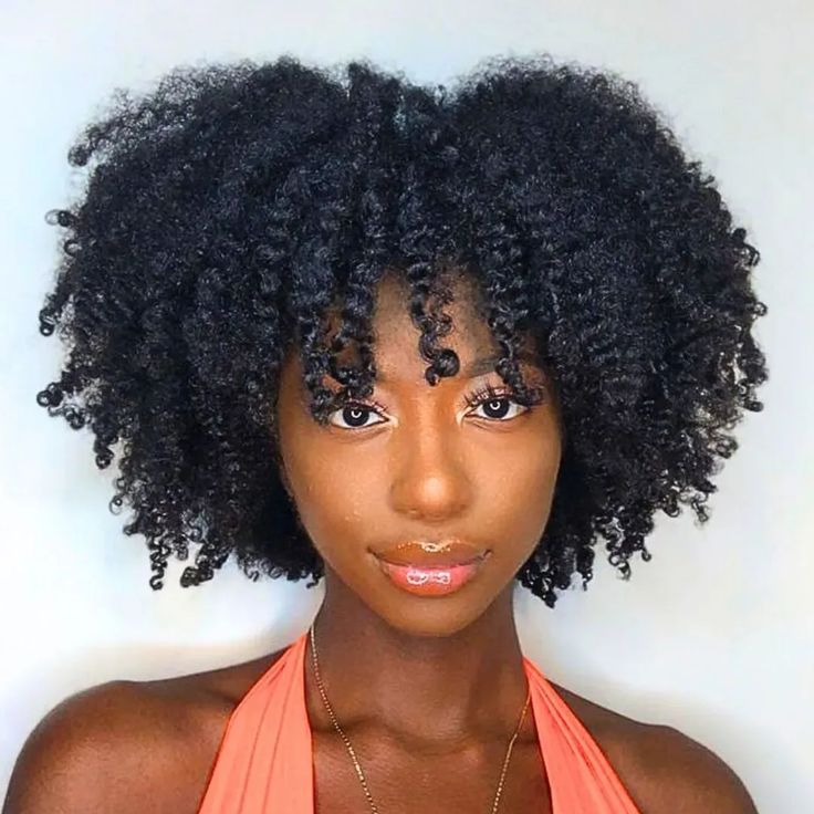 Twist-out styled with a rounded natural bang