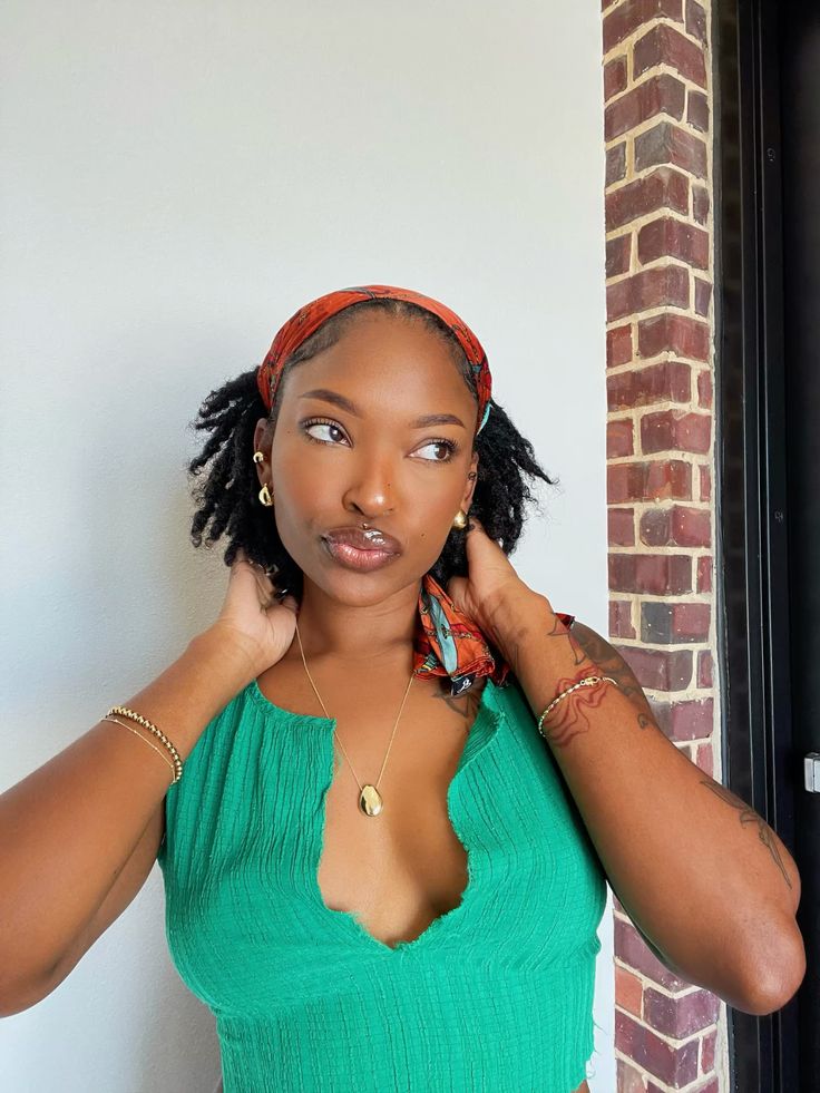 Starter loc accessorized with a patterned scarf