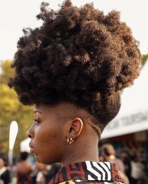 Natural 4C puff hairstyle with shaved sides