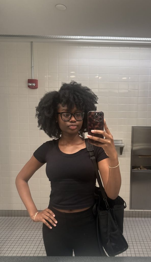 Side-parted afro hairstyle for natural 4C hair
