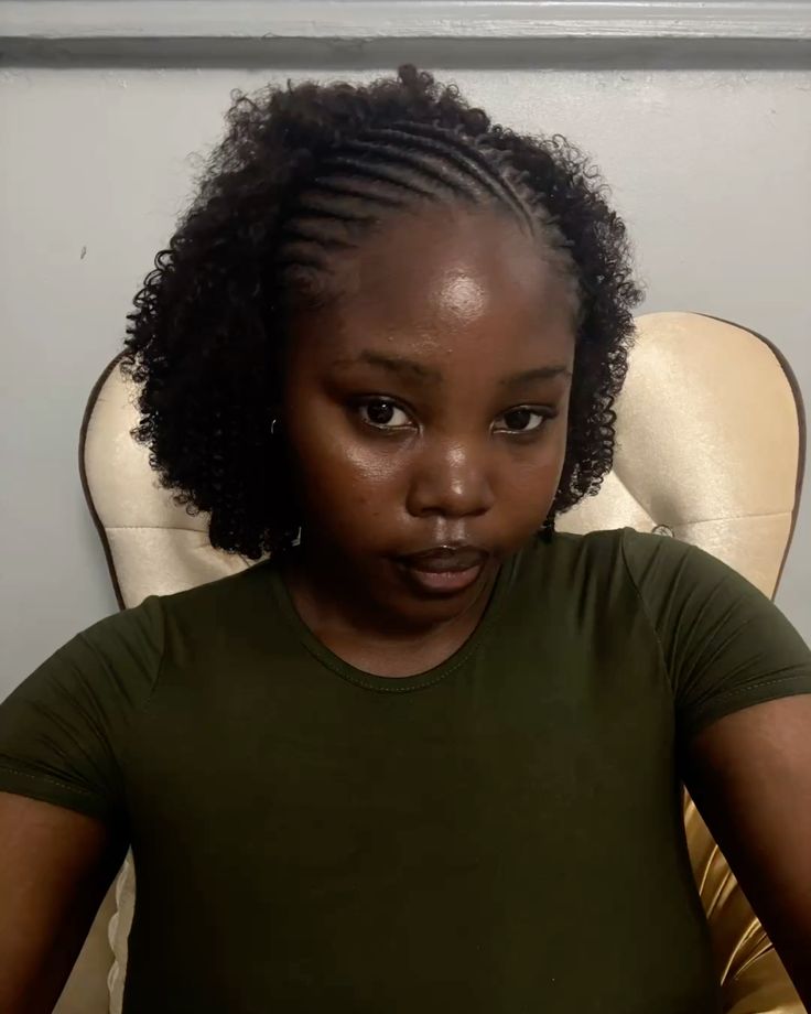 Side-parted cornrows with loose ends for natural 4C hair