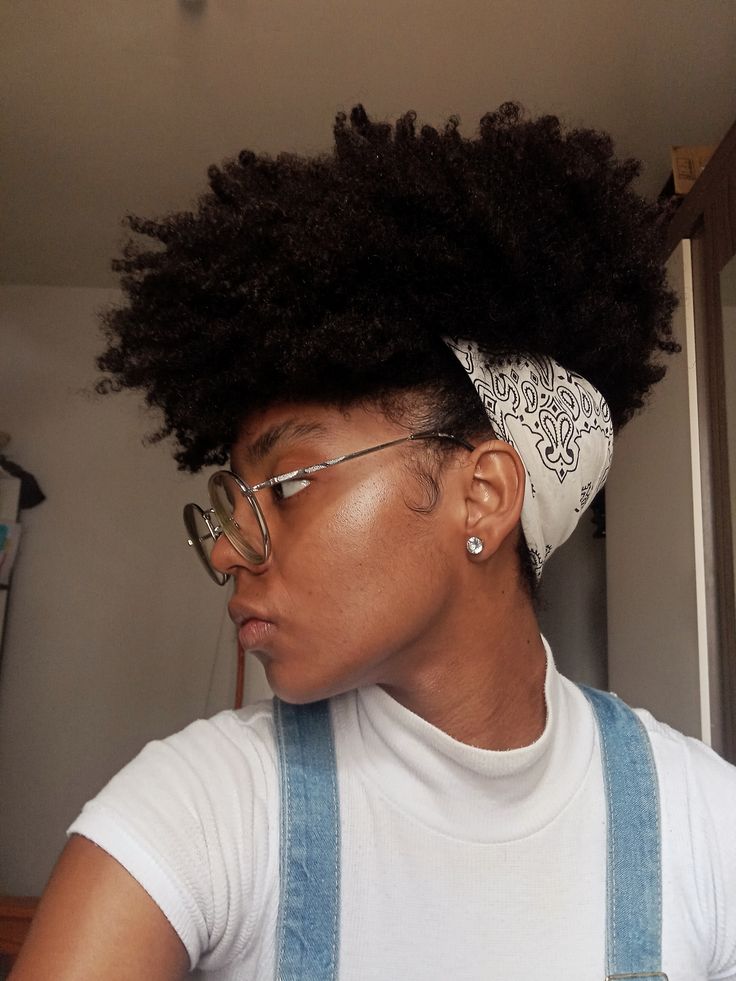 Woman wearing a side puff with a scarf for rainy day