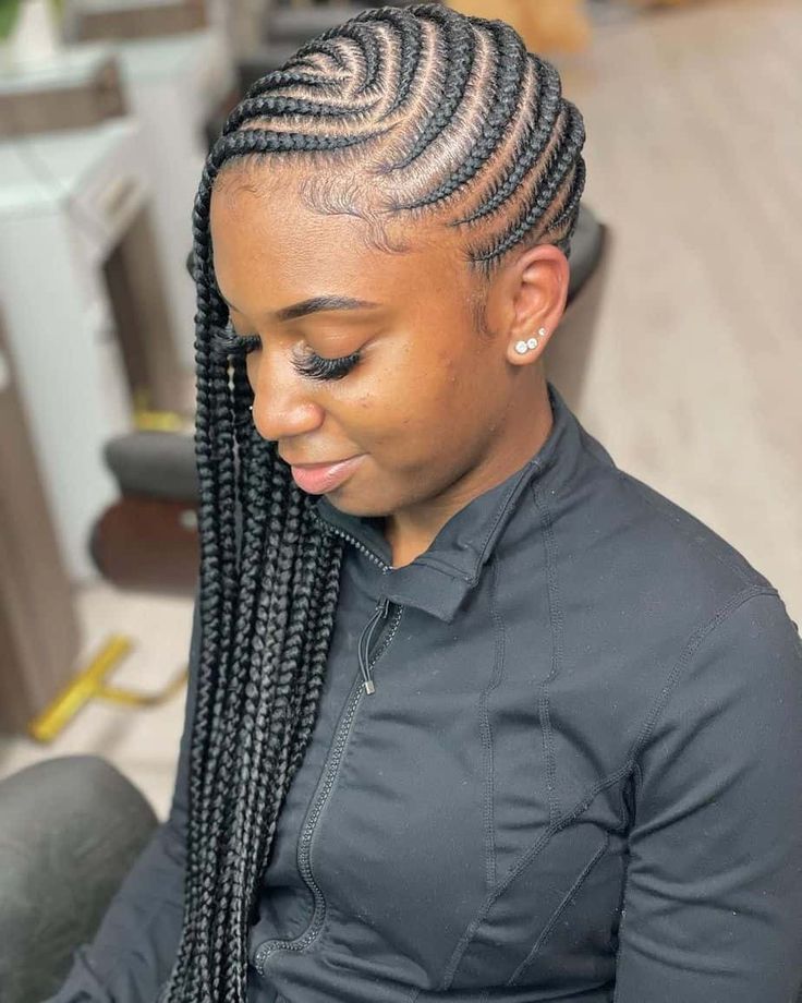 Woman wearing long side-swept braids