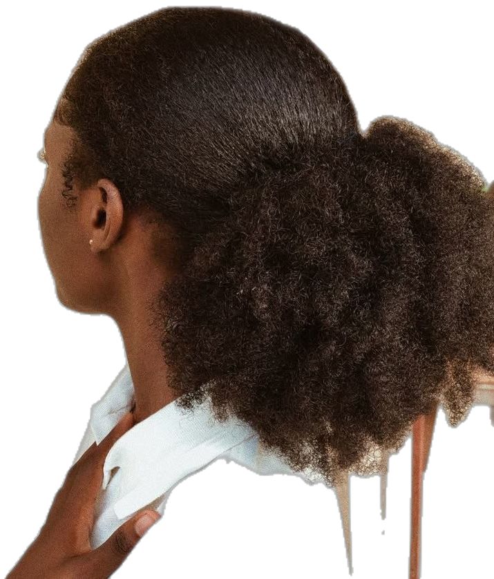 Black woman with healthy natural 4C hair that doesnt need rice water
