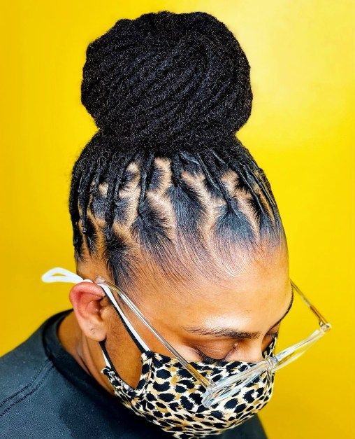 Elegant simple updo created with longer starter locs