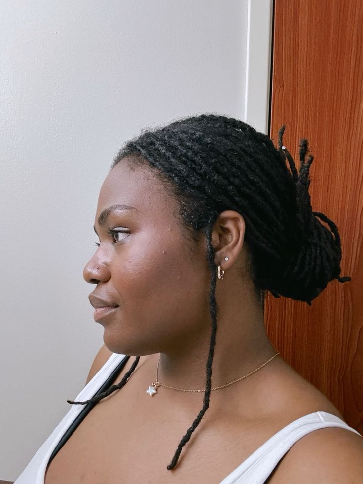 Small loose bun created with mature starter loc