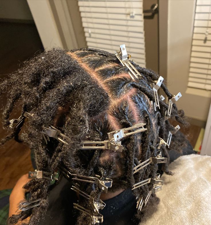 Gentle retwist maintenance on developing natural locs