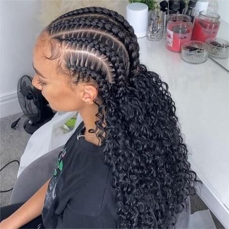 Stitch cornrows with curly extensions