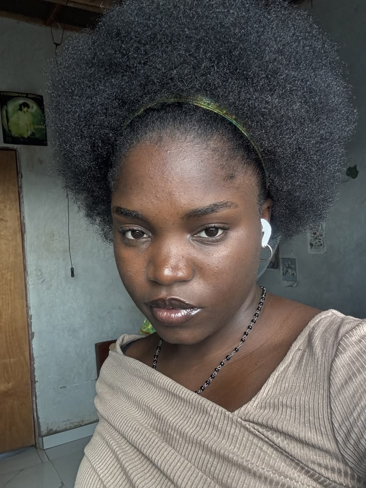 Stretched afro school hairstyle for natural 4C hair
