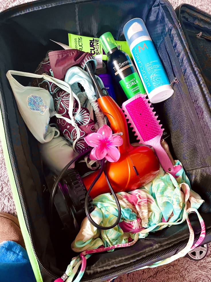 Natural hair products packed for a summer trip