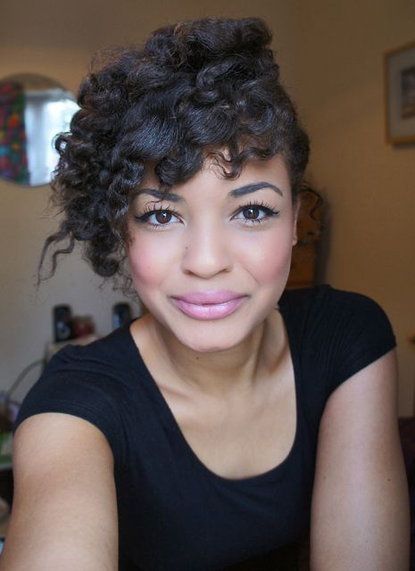 Twist-out ideas for 4C hair featuring a soft side sweep