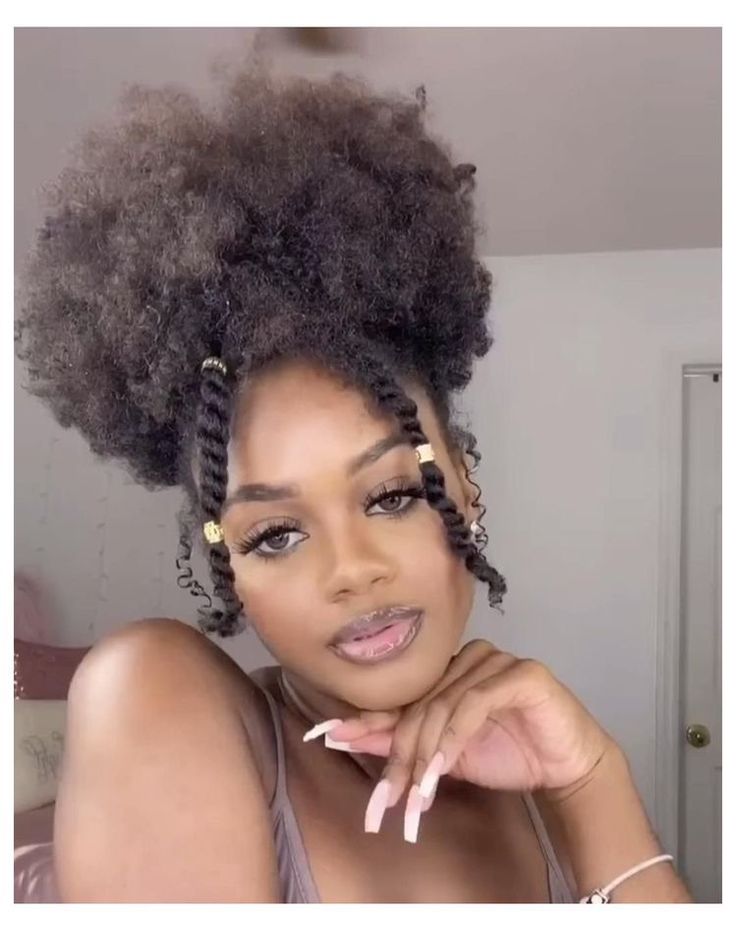 Natural 4C puff hairstyle with twisted front sections
