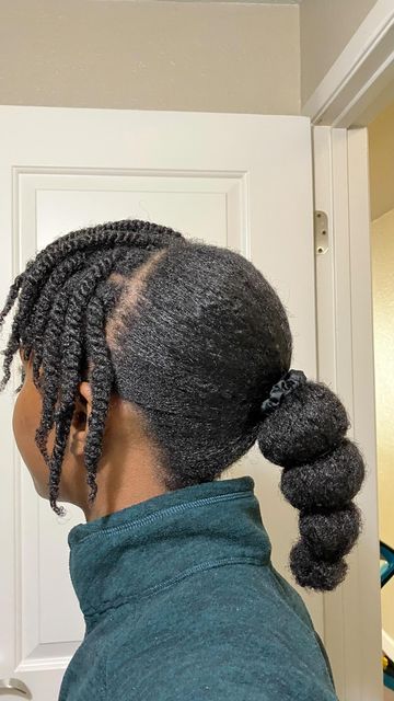 Woman wearing a twisted headband updo on natural hair