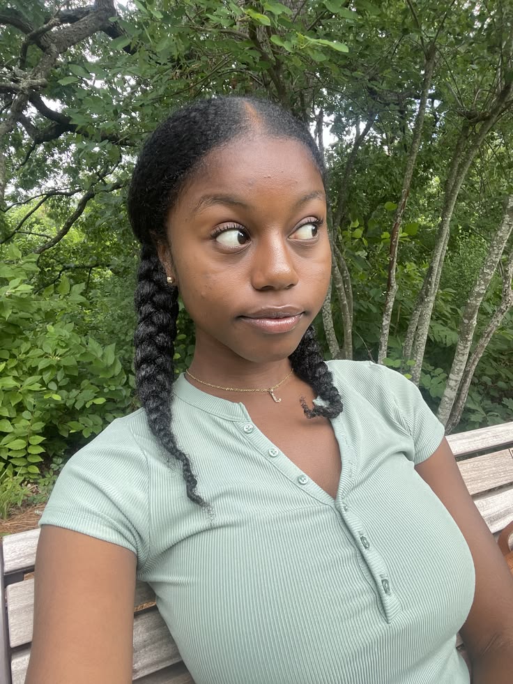 Two braided pigtails school hairstyle for natural 4C hair