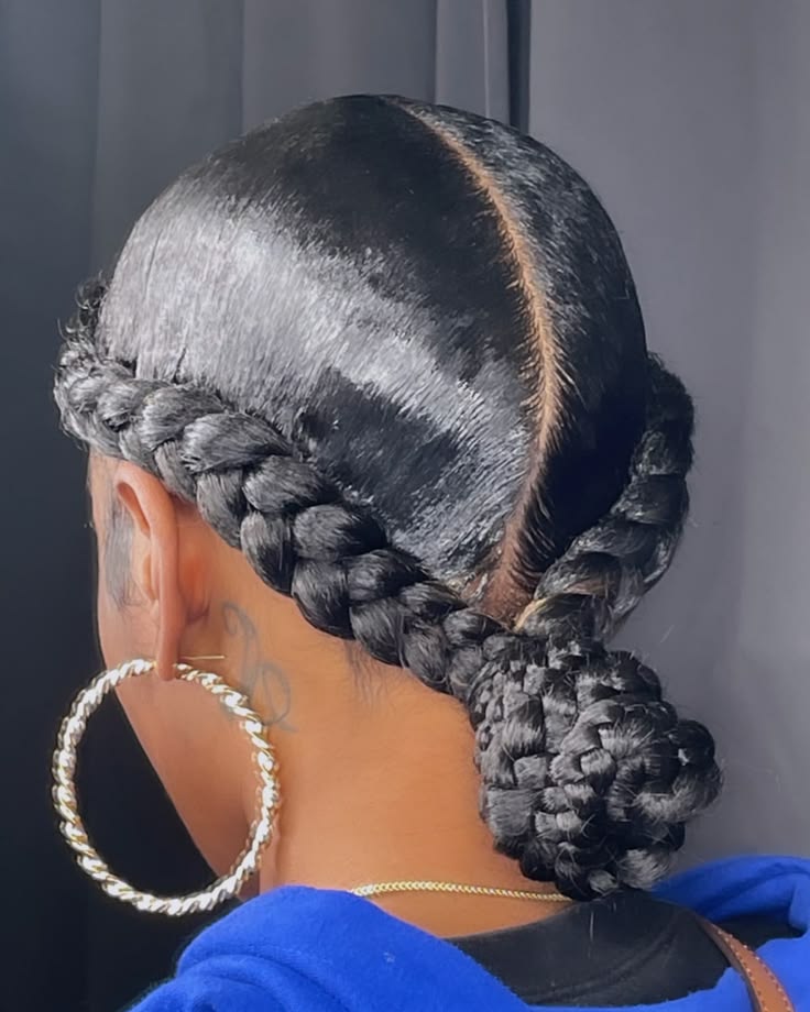 Two cornrows with bun protective hairstyle