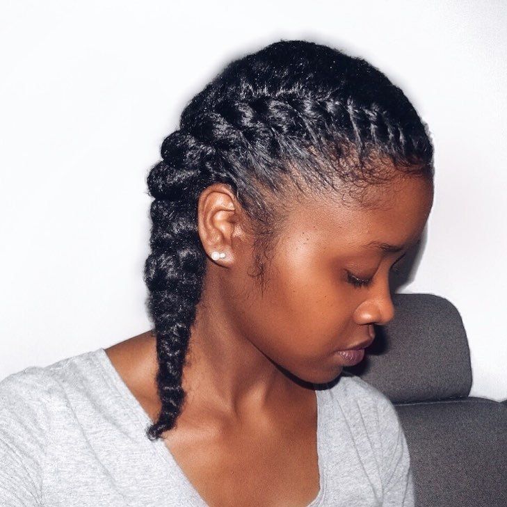 Woman with two French braids on natural hair