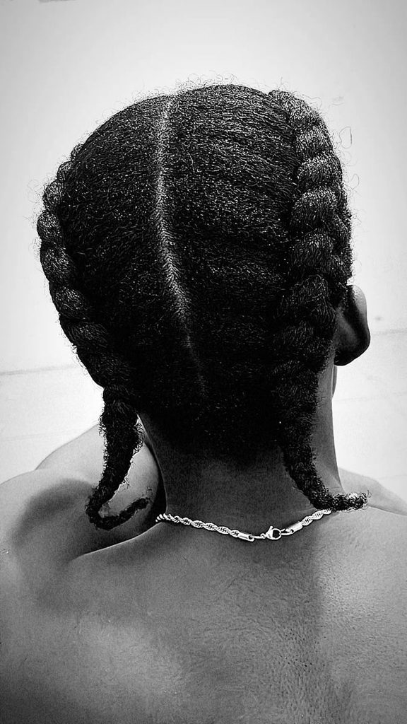 Two straight-back cornrows for natural 4C hair
