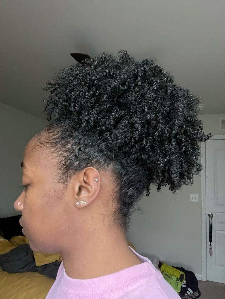 Natural 4C wash-and-go hair styled into a puff