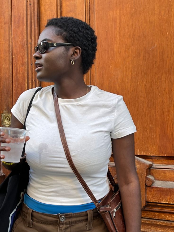 Woman confidently wearing short natural 4C hair after a big chop