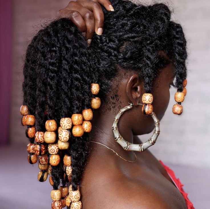 Natural hairstyle decorated with wooden beads
